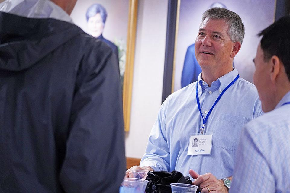 Alumni enjoy a reception inside the School of Medicine during SLU's 2025 Med Reunion. Photo by Megan Favignano Mansouri.