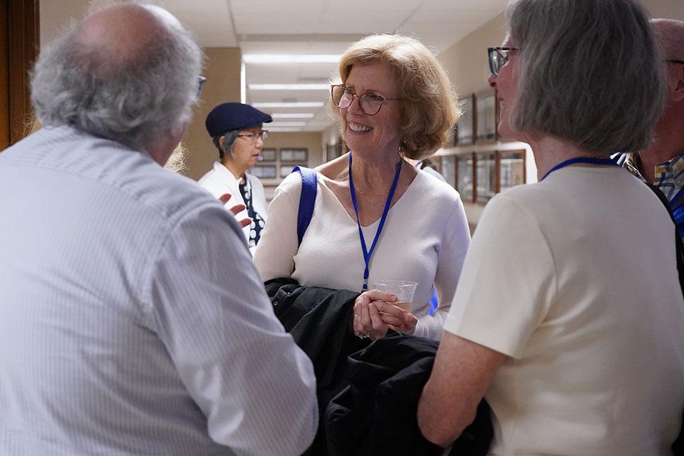 Alumni enjoy a reception inside the School of Medicine during SLU's 2025 Med Reunion. Photo by Megan Favignano Mansouri.