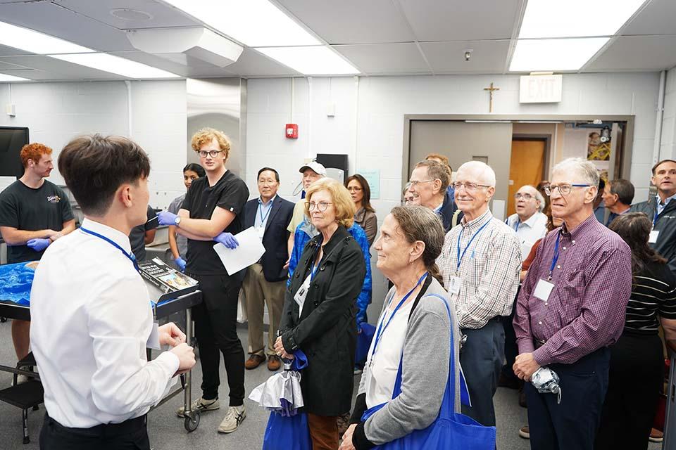Alumni tour the School of Medicine during SLU's 2025 Med Reunion. Photo by Megan Favignano Mansouri.