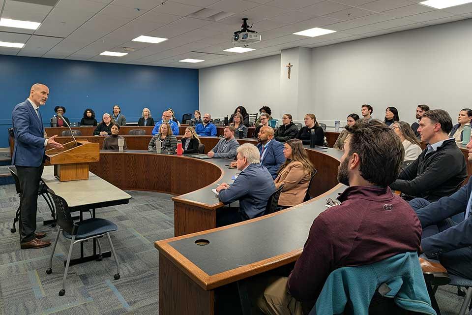 President Feser meets with SLU's Division of Enrollment Management on Oct. 27, 2025.