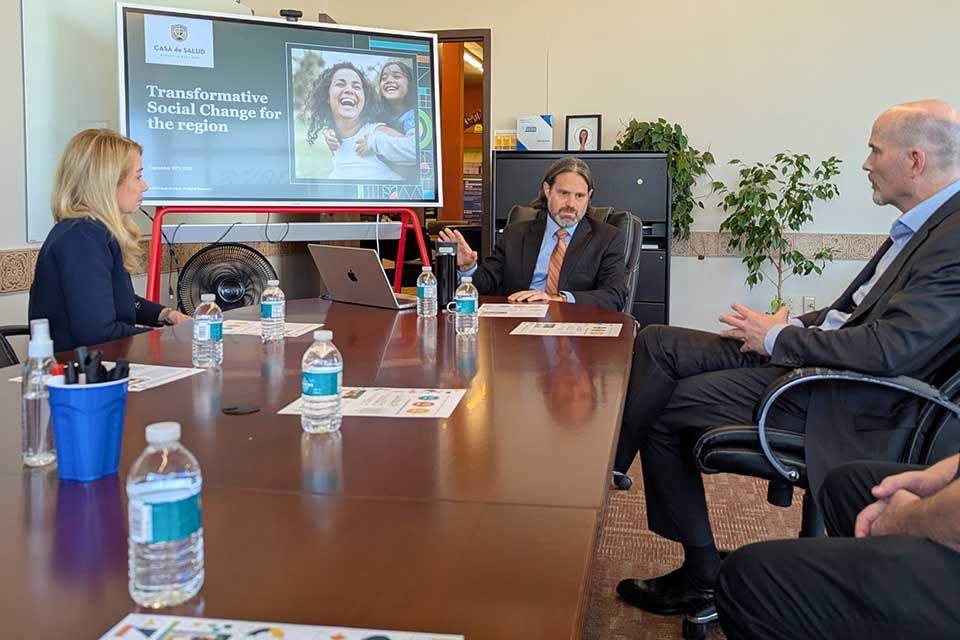 During a visit to Casa de Salud on Sept. 30, 2025, President Feser meets with CEO Diego Abente and Board Chair Claire Schenk.