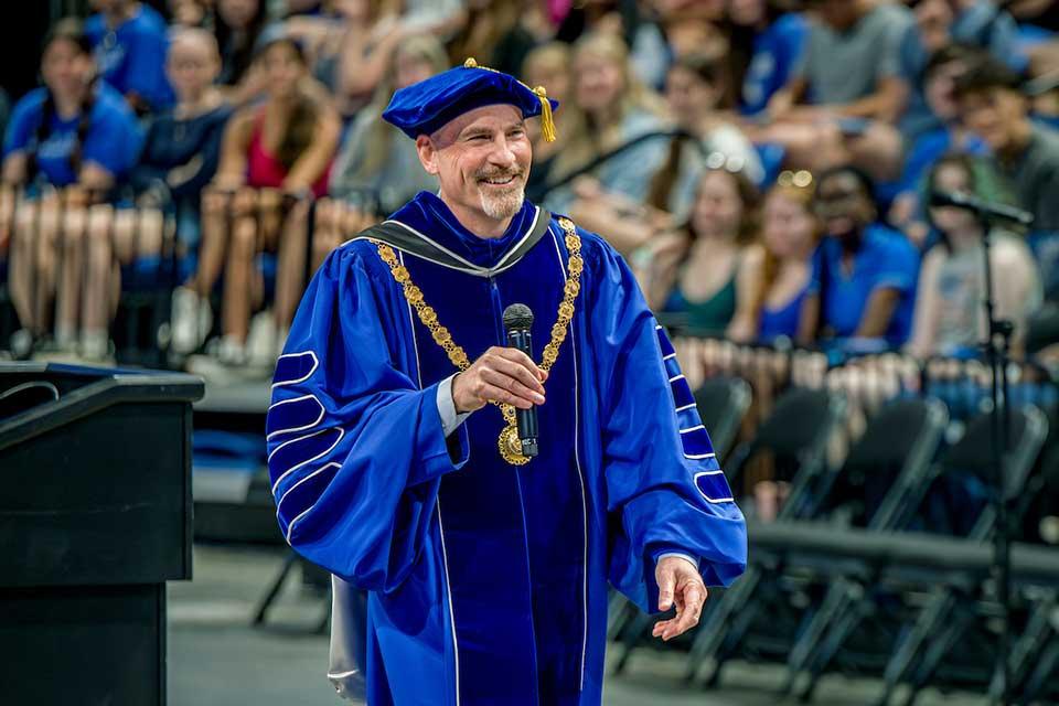 President Feser addresses new students and families during his first Convocation on Aug. 16, 2025.