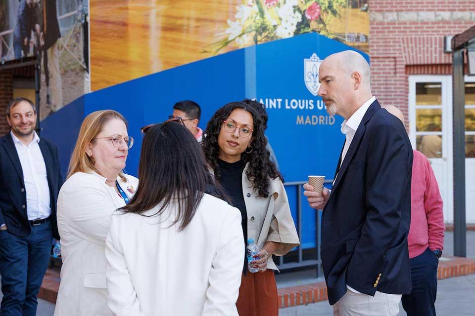 President Feser greets SLU-Madrid faculty and staff on Oct. 7, 2025.