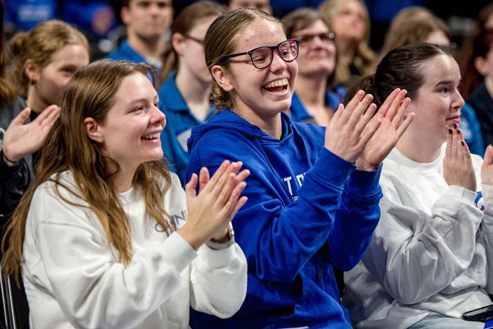 Students cheer during the inauguration of SLU"s 34th president, Edward Feser, Ph.D. Photo by Sarah Conroy.