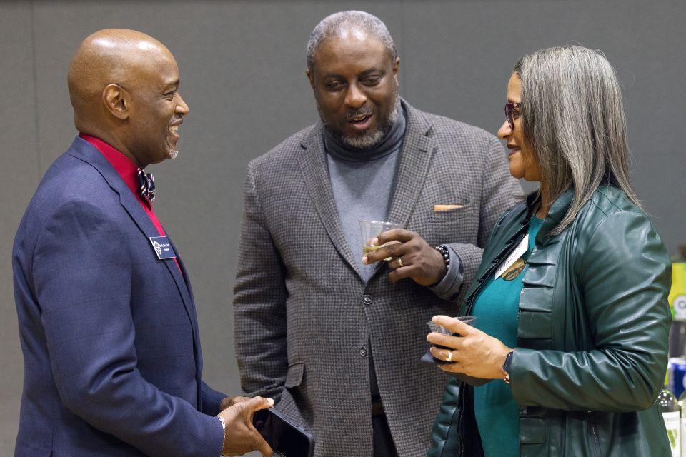 Attendees mingle during the William L. Clay Sr. Institute of Civic Engagement and Economic Justice Open House on November 11, 2025. Photo by Sarah Conroy. 
