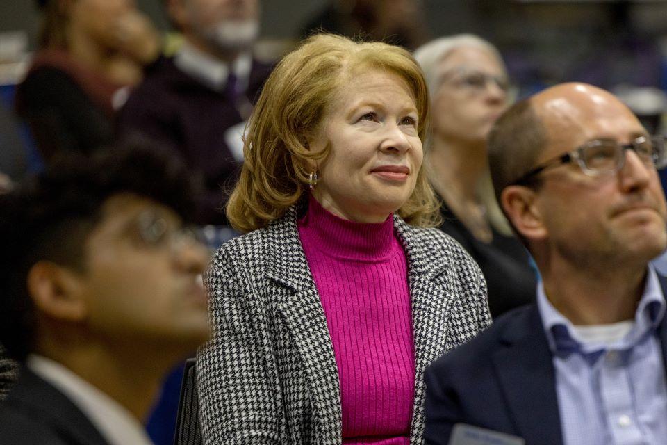 Angie Clay Thomas watches a video about her grandfather during the William L. Clay Sr. Institute of Civic Engagement and Economic Justice Open House on November 11, 2025. Photo by Sarah Conroy. 