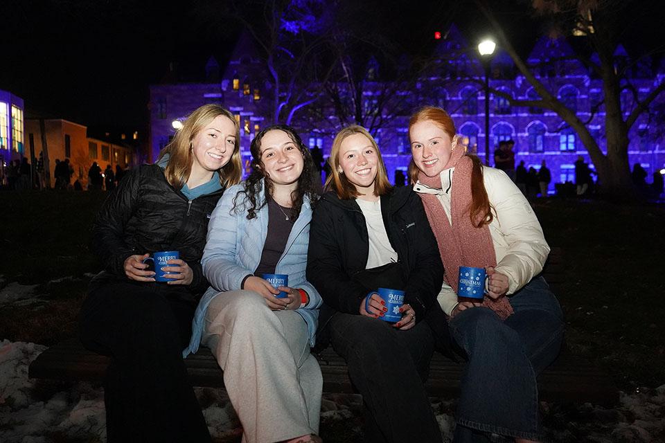 Attendees enjoy hot chocolate during Christmas on the Quad on Dec. 6, 2025. Photo by Megan Favignano Mansouri.