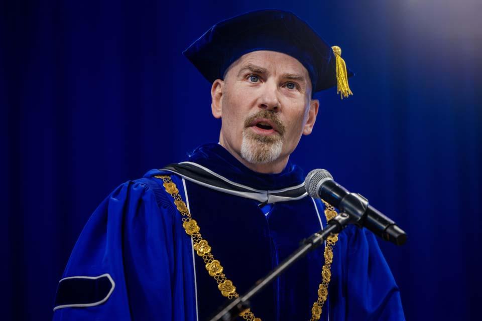 President Edward Feser, Ph.D., addresses the graduates during Midyear Commencement on Dec. 13, 2025. Photo by Sarah Conroy.