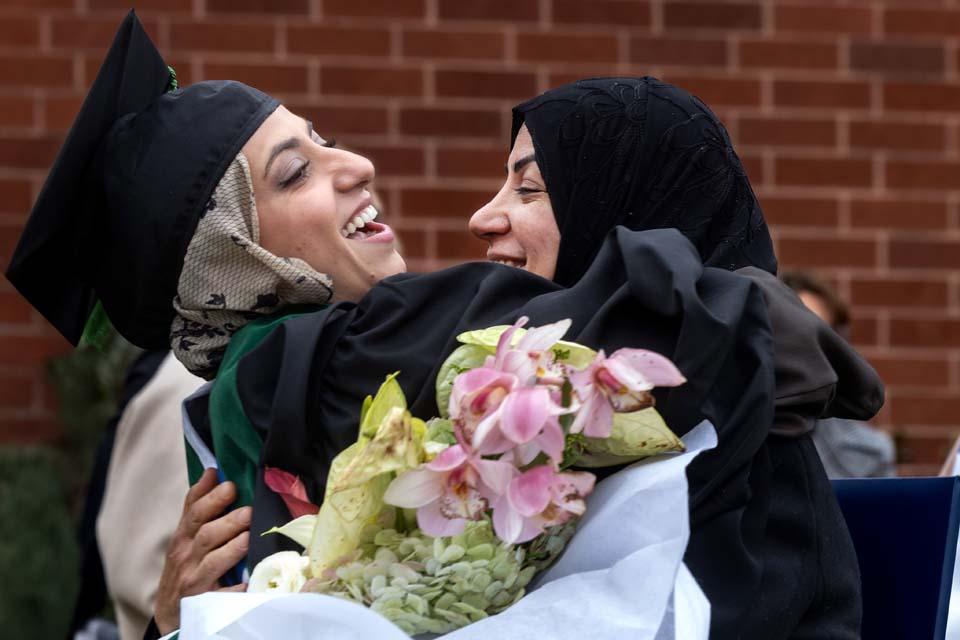 Graduates celebrate with family after Midyear Commencement on D 1ec.3, 2025. Photo by Sarah Conroy.