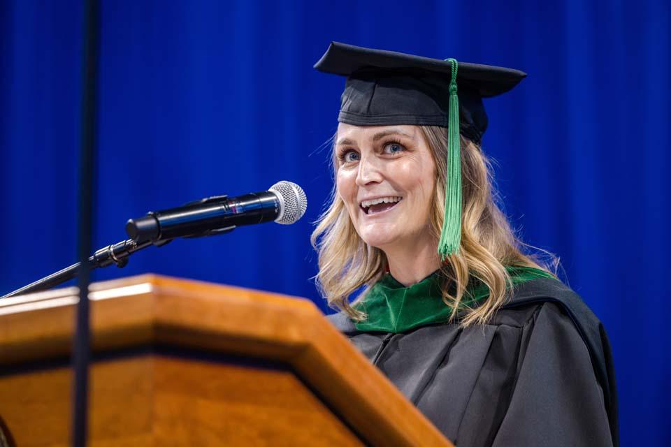 Nancy McNeir Ring Award winner Marcea Walter addresses the graduates during Midyear Commencement on Dec. 13, 2025. Photo by Sarah Conroy.