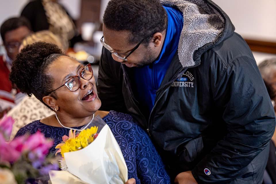 Donna Bess Myers, former Dean of Students, left is congratulated during the 2026 Martin Luther King Jr. Memorial Tribute on Jan. 22, 2026. Photo by Sarah Conroy.