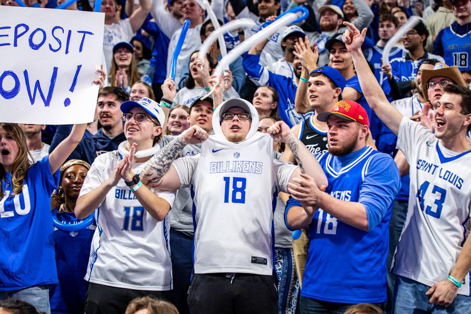 SLU students crowd and celebrate the admitted students attending the men's basketball game vs. La Salle.