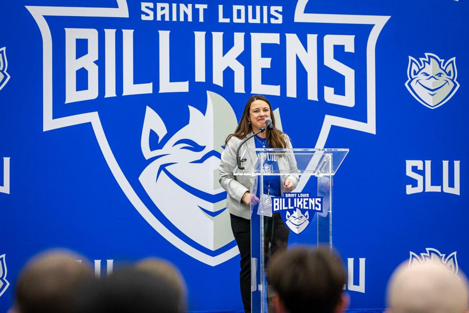 The interim vice president of enrollment management, Jean Marie Cox, speaks to admitted students and their families before the men's basketball game vs. La Salle.