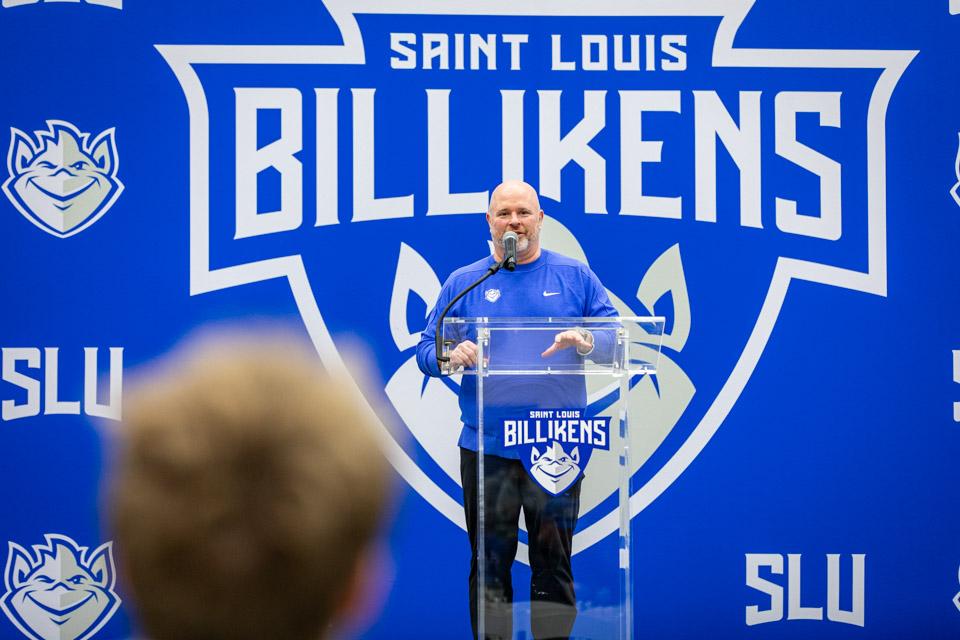 Coach Schertz speaks to admitted students and their families before the men's basketball game vs. La Salle.