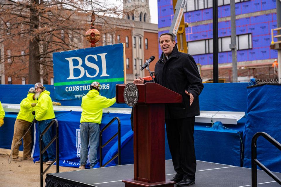 Christopher Collins, S.J., assistant to the president for mission and identity, offers a blessing as SLU prepares to top-out the new Interdisciplinary Science and Engineering (ISE) Building. Photo by Steve Long