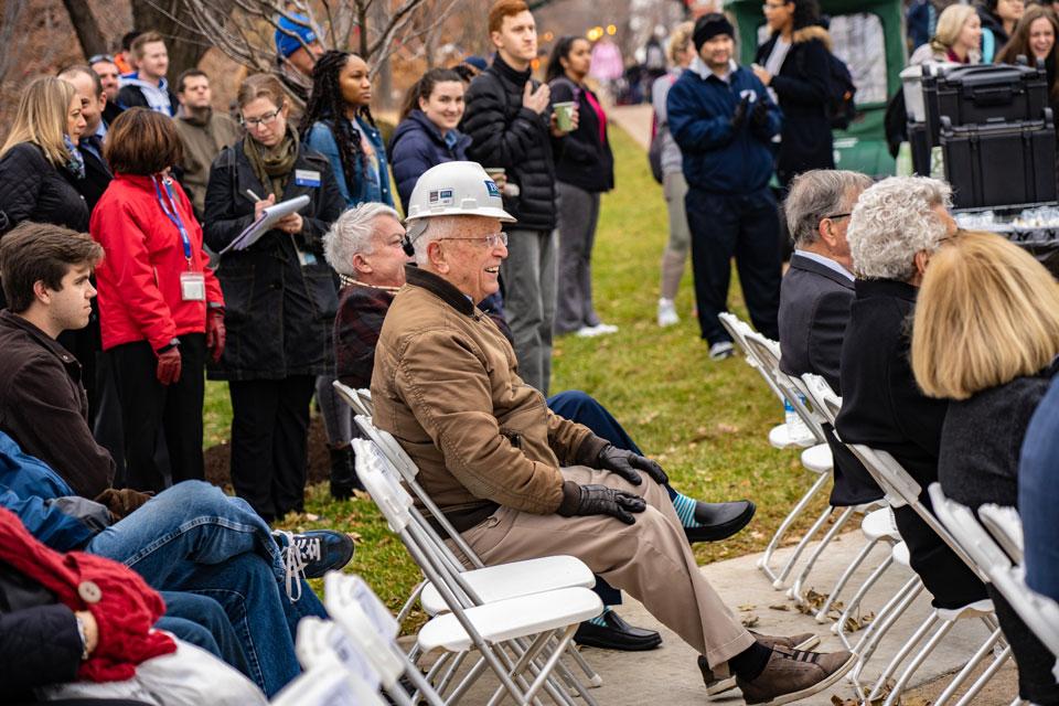 Well wishes and partners like alumnus Joseph Shaughnessy, of BSI Constructors (center) joined the SLU community to celebrate the topping-out. Photo by Steve Long