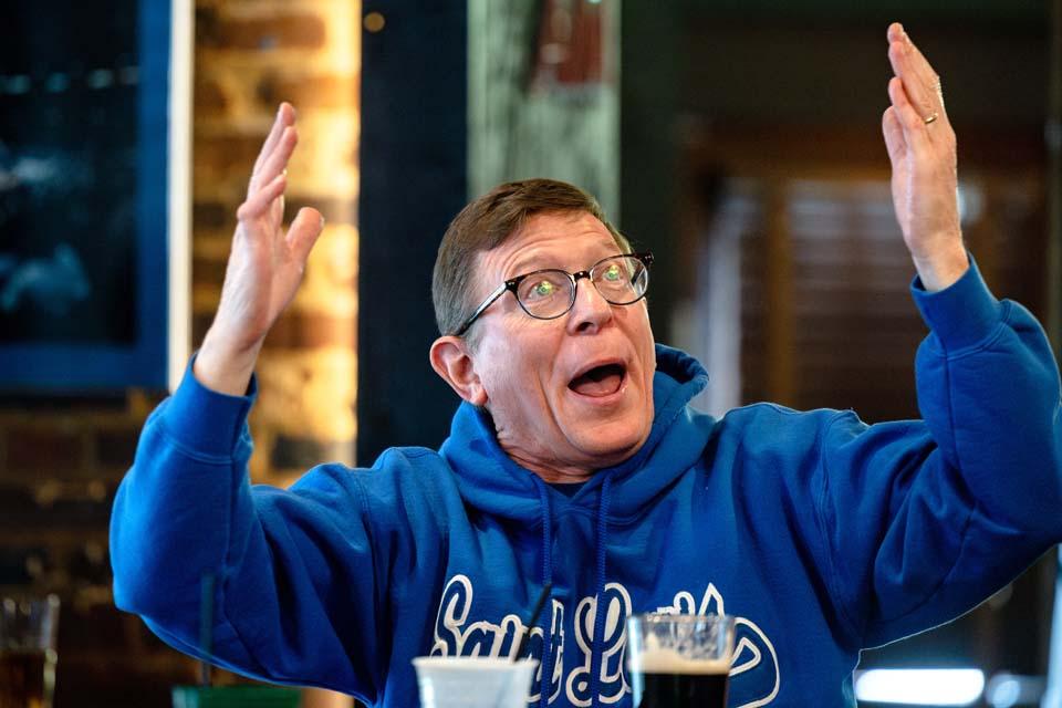 A Billiken fan reacts as they watch the A-10 quarterfinal game against George Washington University during a watch party at Humphrey’s Restaurant and Tavern on March 13, 2026. The Billikens won 88-81. Photo by Sarah Conroy.