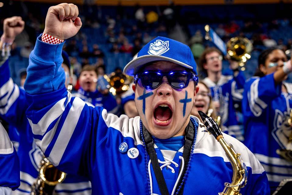 The band cheers during Round 1 of the NCAA Tournament against the University of Georgia at the Keybank Center in Buffalo, NY on March 19, 2026. Photo by Sarah Conroy. 