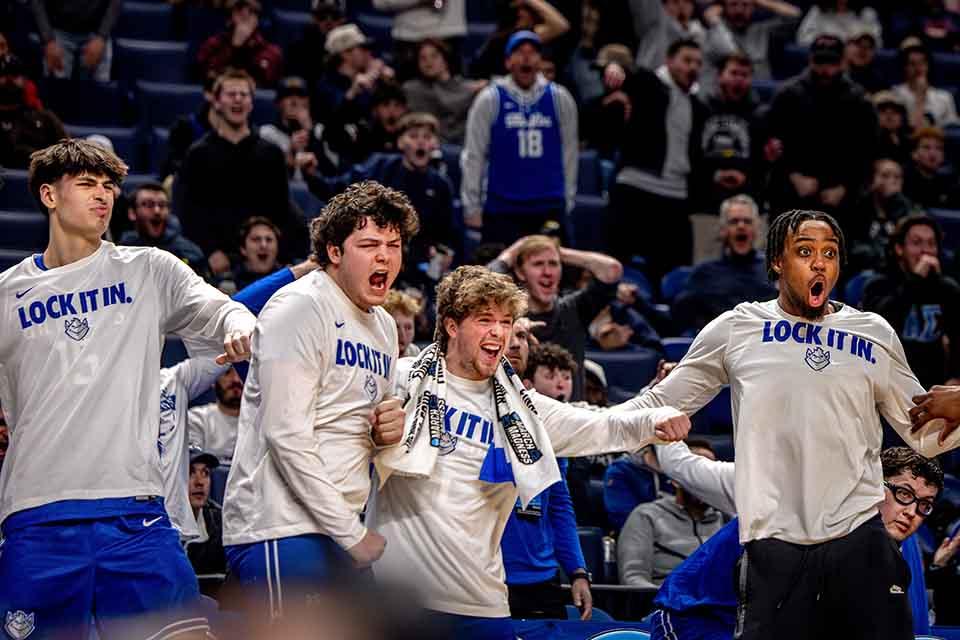 The Billiken bench reacts during Round 1 of the NCAA Tournament against the University of Georgia at the Keybank Center in Buffalo, NY on March 19, 2026. Photo by Sarah Conroy. 