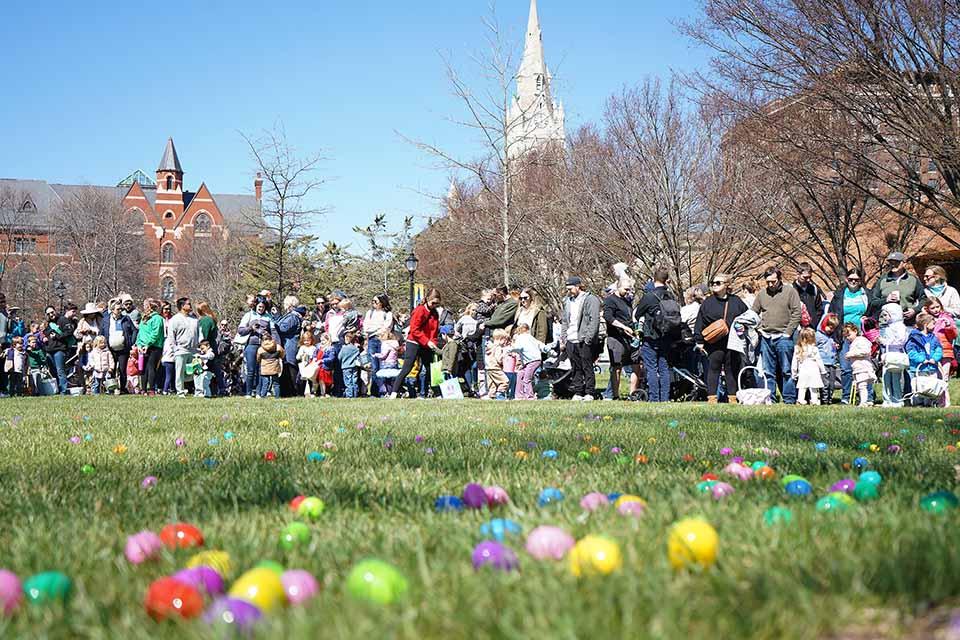 Alumni and their children line up on campus to prepare for the Easter Egg hunt on March 28, 2026. Photo by Megan Favignano-Mansouri.