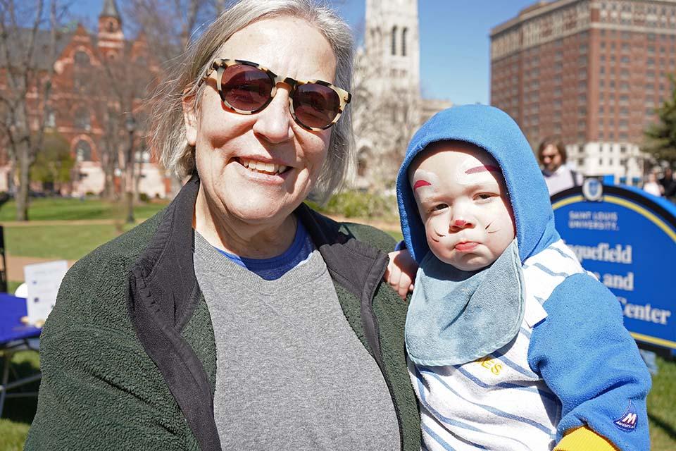Families enjoy face painting at the Easter Egg Hunt on March 28, 2026. Photo by Megan Favignano-Mansouri.