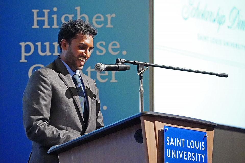 SLU student Aakash Nagarapu speaks at the 2026 Scholarship Dinner. Photo by Megan Favignano-Mansouri.