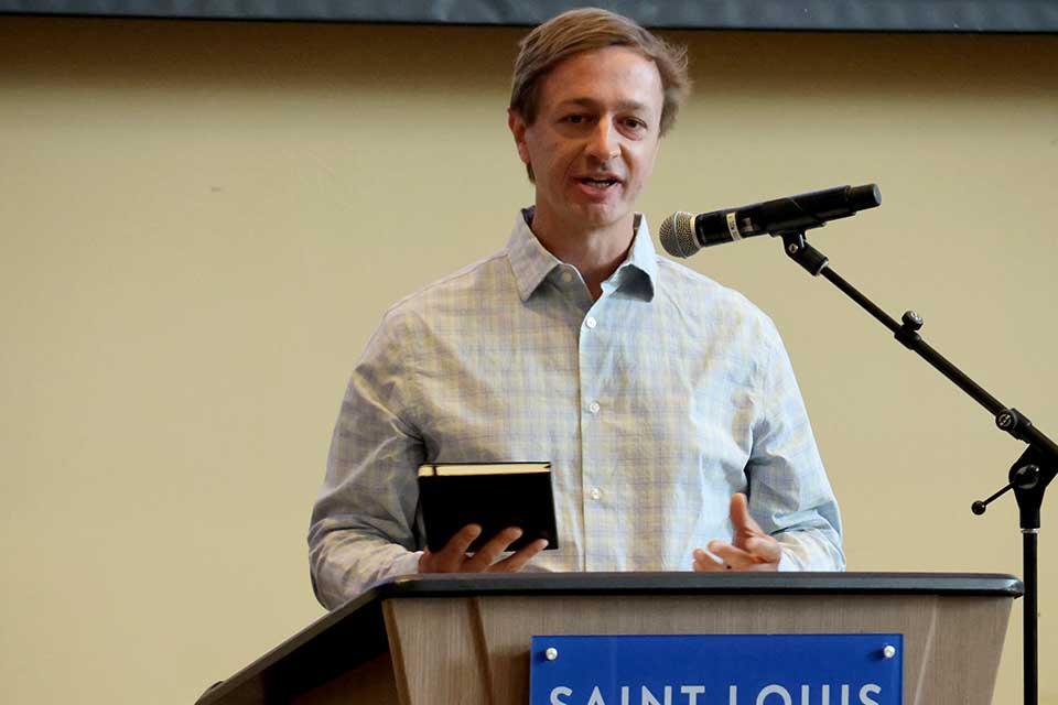 Kyle McCommis, Ph.D., received the Faculty Research Award at the 2026 Scholarly Works and Grant Winners Reception on Wednesday, April 29. Photo by Joe Barker. 
