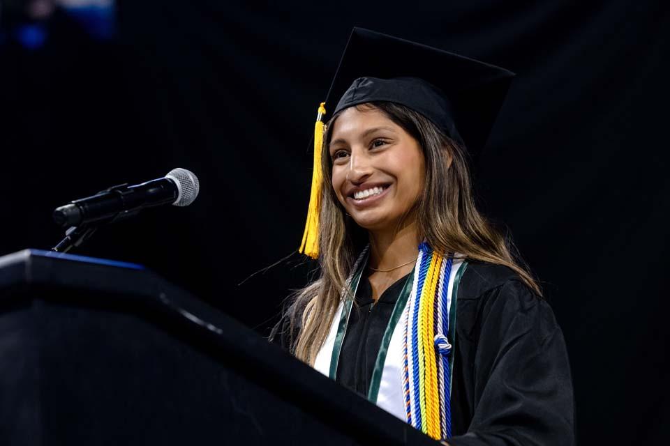 Graduate Riya Aradhyula gives the student address during commencement on May 16, 2026. Photo by Sarah Conroy.