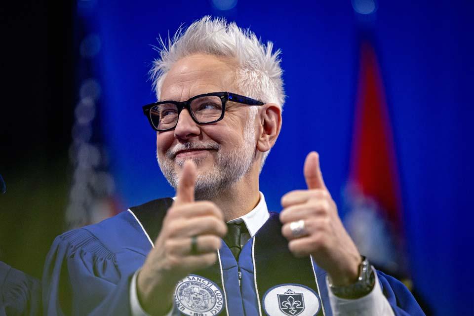 Commencement speaker James Gunn gives a thumbs up during SLU's spring commencement ceremony on Saturday, May 16, 2026. Photo by Sarah Conroy.