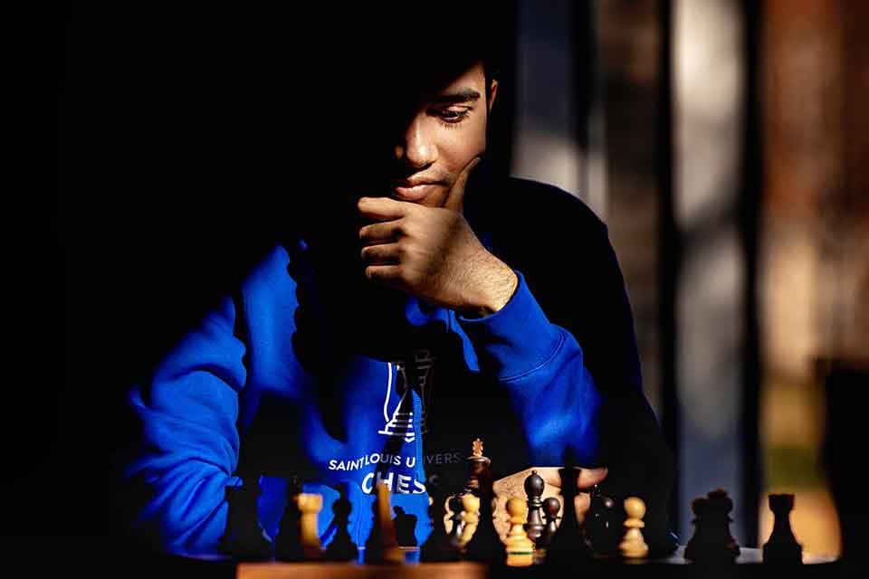 This photo of SLU chessmaster Aryan Chopra won second place in the general features category in the University Photographers' Association of America annual contest. Photo by Sarah Conroy.