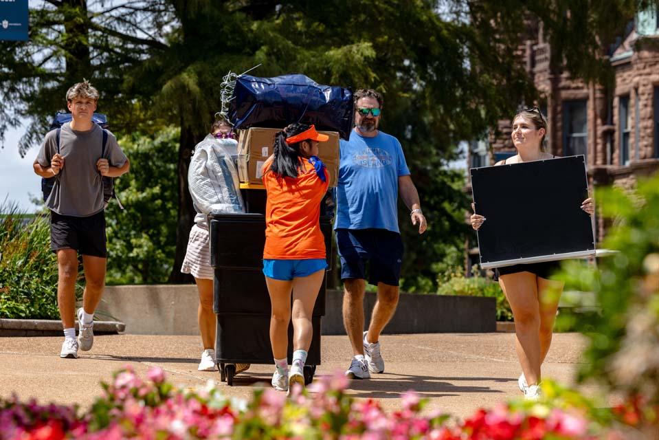 New students move into residence halls during Move-In on Friday, Aug. 14, 2026. Photo by Sarah Conroy.