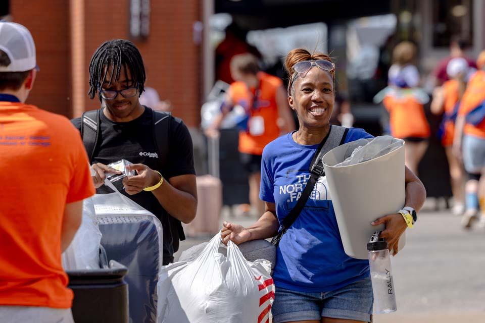 New students move into residence halls during Move-In on Friday, Aug. 14, 2026. Photo by Sarah Conroy.