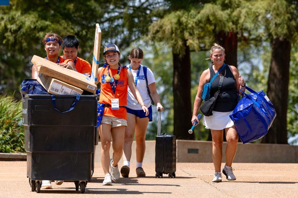 New students move into residence halls during Move-In on Friday, Aug. 14, 2026. Photo by Sarah Conroy.
