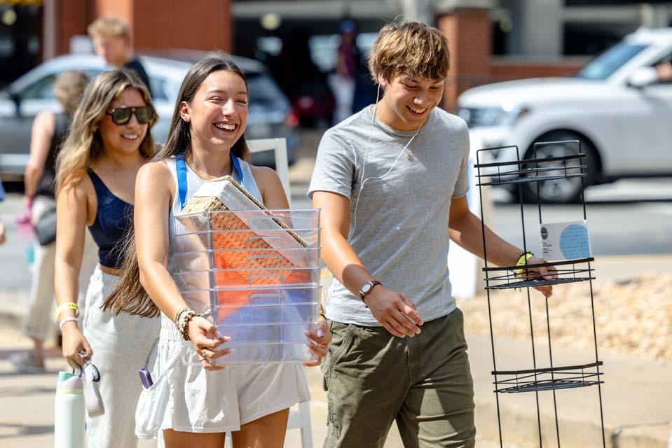 New students move into residence halls during Move-In on Friday, Aug. 14, 2026. Photo by Sarah Conroy.