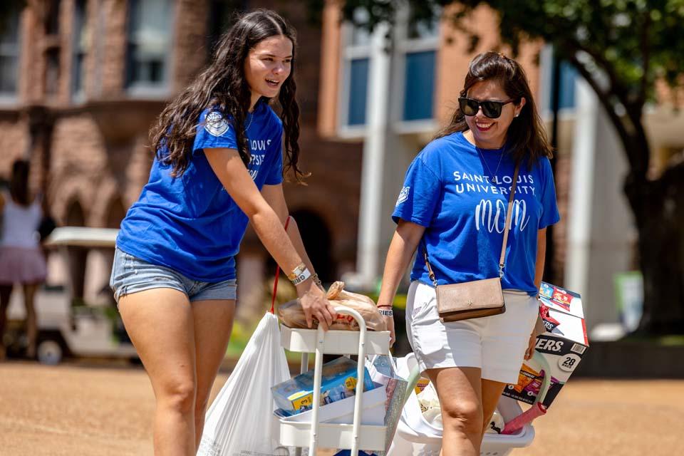New students move into residence halls during Move-In on Friday, Aug. 14, 2026. Photo by Sarah Conroy.