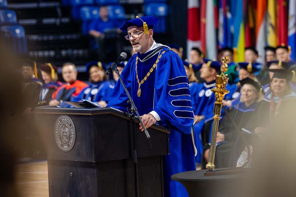 President Edward Feser, Ph.D., addresses new students during convocation on Aug. 18, 2026. Photo by Sarah Conroy.