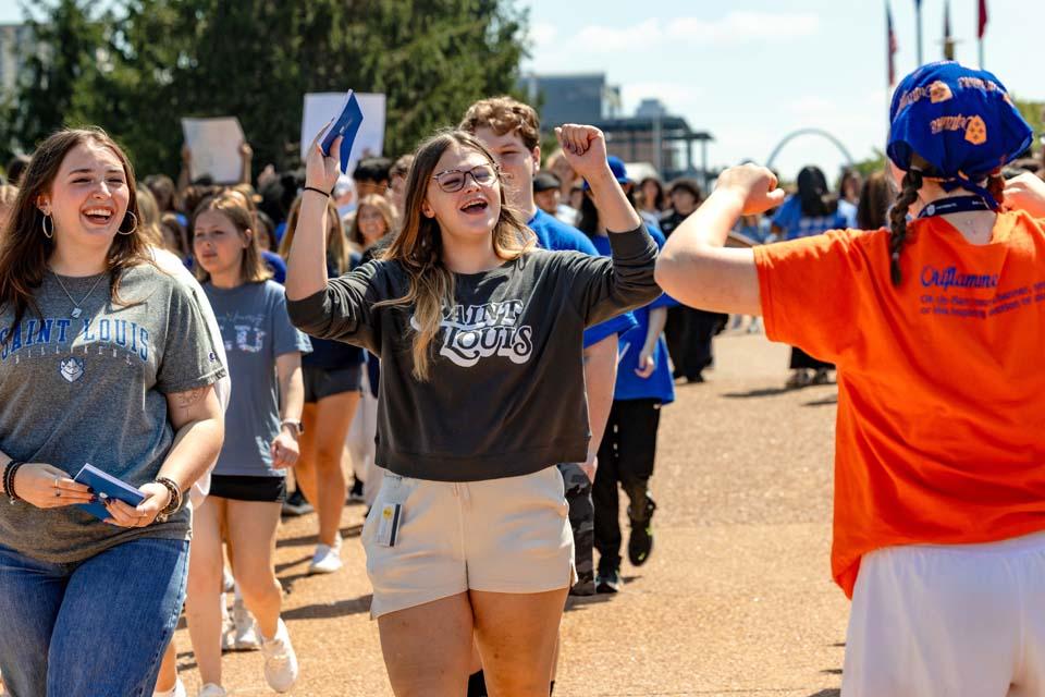 New students are cheered by members of the SLU community after convocation on Aug. 18, 2026. Photo by Sarah Conroy.