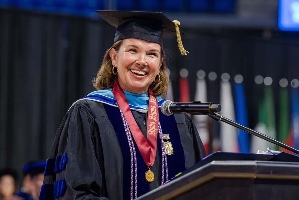 Cristina McGroarty, Ph.D., associate professor in the Trudy Busch Valentine School of Nursing, addresses the new students during convocation on August 18, 2026. Photo by Sarah Conroy.