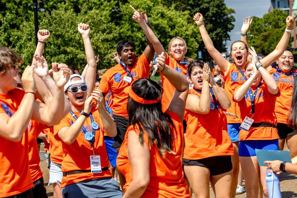 New students are cheered by members of the SLU community after convocation on Aug. 18, 2026. Photo by Sarah Conroy.
