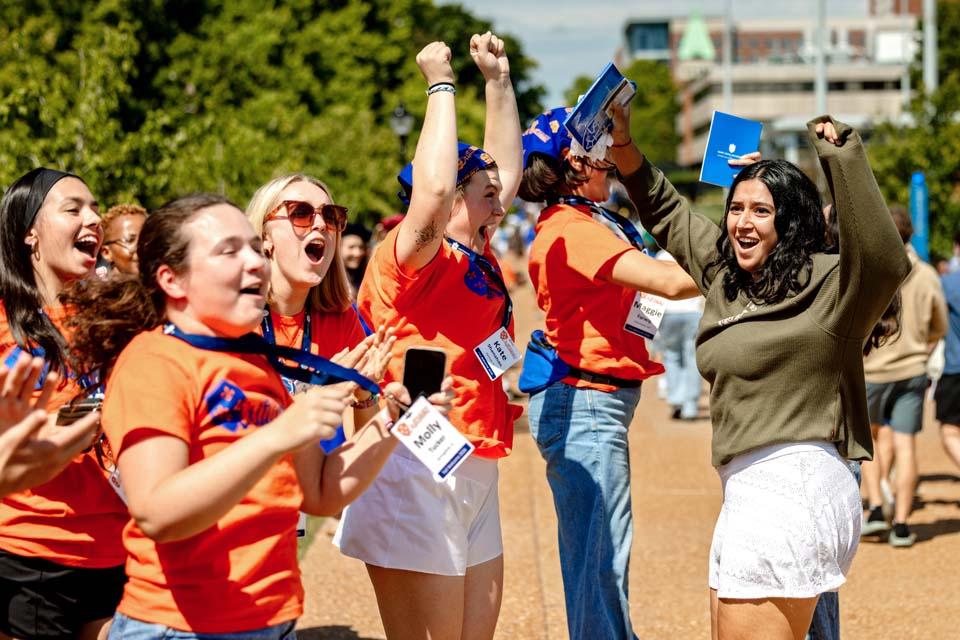New students are cheered by members of the SLU community after convocation on Aug. 18, 2026. Photo by Sarah Conroy.