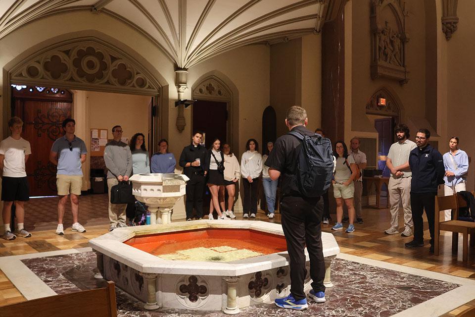 The Camino de SLU pilgrims gather for reflection in St. Francis Xavier College Church. Photo by Maggie Rotermund.