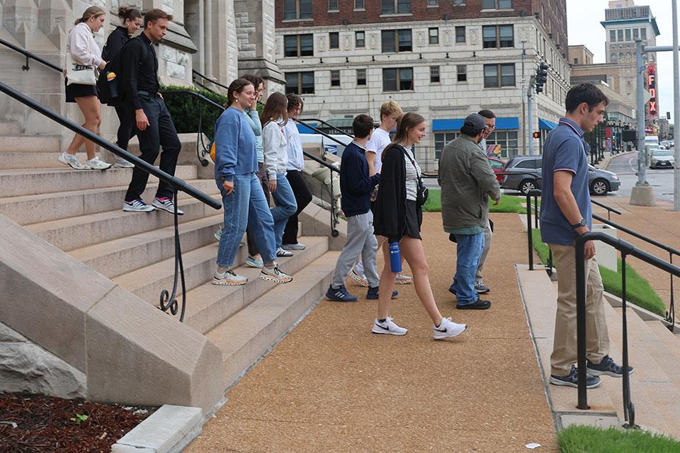 The Camino de SLU pilgrims leave St. Francis Xavier College Church. Photo by Maggie Rotermund.