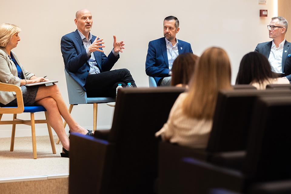 Saint Louis University President Edward Feser, Ph.D., addresses faculty and staff during an open forum at SLU-Madrid on Sept. 22, 2026, discussing the University's strategic priorities and opportunities for collaboration between its two campuses. Photo by Sarah Conroy.