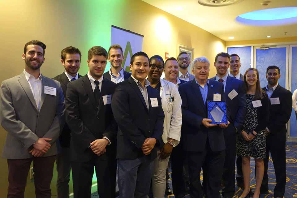 The founders and executive board members of MEDLaunch pose with Jerry Dwyer, M.D., M.B.A., a member of the Board of Advisors. Photo by Maggie Rotermund