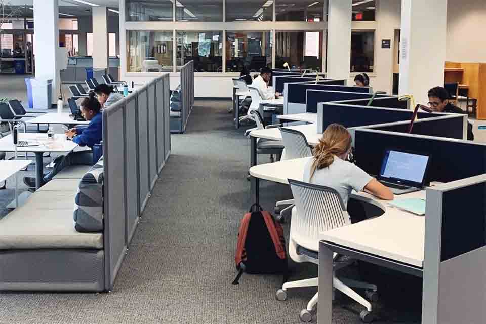 Medical Center Library interior view showing students working at desks.