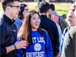 SLU Student Jenna Kim among a crowd of fellow slu students
