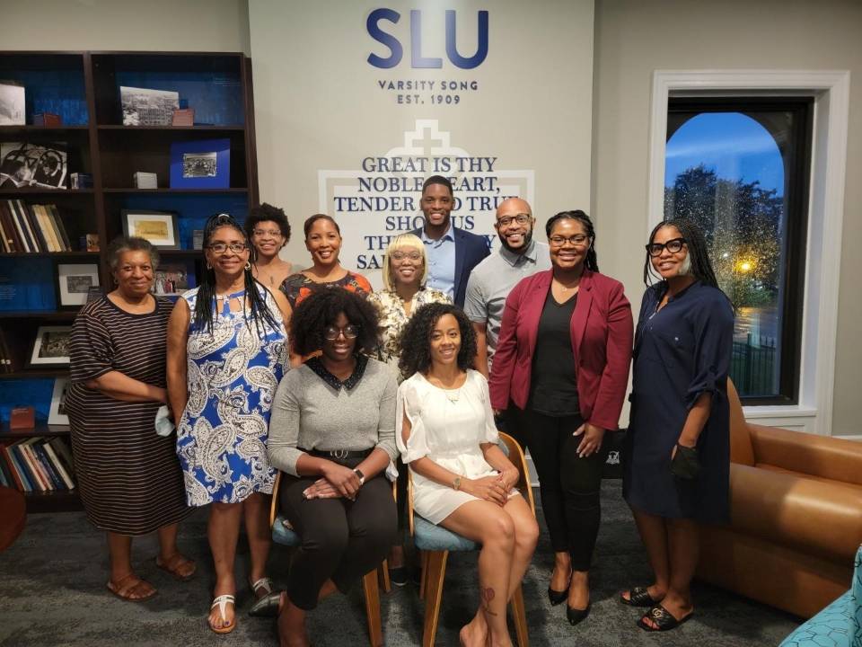 The 2021-22 Black Alumni Association Board poses for a group photo in Bannister Alumni House on SLU's north campus.