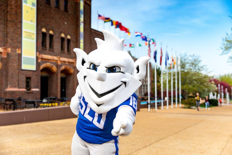 The Billiken in front of the Center for Global Citizenship