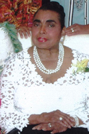 Photo of a woman wearing a wedding dress.