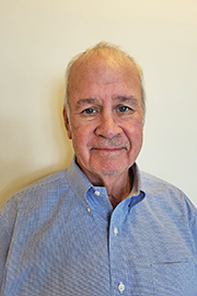 A headshot photo of Bill Hopfinger